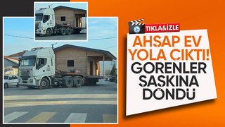 Ahşap evi tırla taşıdılar