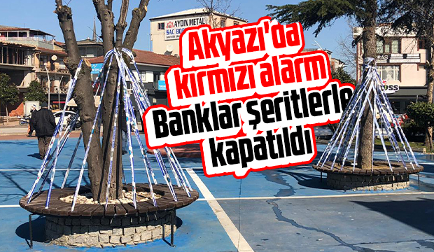 Akyazı'da banklar şeritlerle kapatıldı