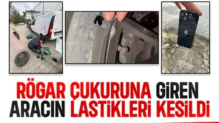 Akyazı'da rögar çukuruna giren aracın iki lastiği kesildi.