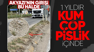 Akyazı girişi izmarit ve kum yığınları ile misafirlerini karşılıyor