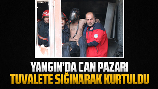 Alevlere teslim olan dükkanda tuvalete sığınıp kurtuldu