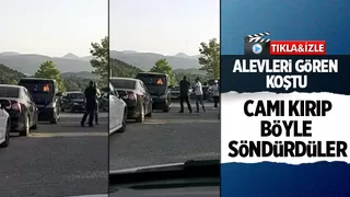 Alevleri gören koştu,camı kırıp söndürdüler