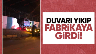 Araç fabrika duvarını yıkıp içeri girdi