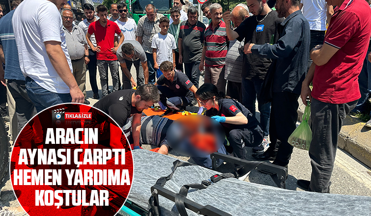 Aracın aynasının çarptığı motosikletli düşüp yaralandı