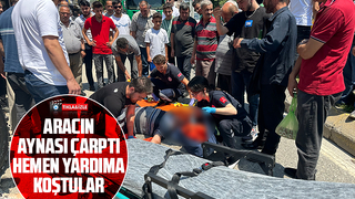 Aracın aynasının çarptığı motosikletli düşüp yaralandı