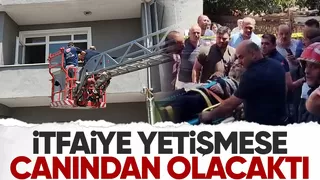 Ayakları kırık olan kişiyi yangından itfaiye kurtardı