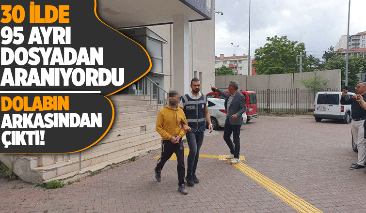 Azılı dolandırıcı dolabın arkasında yakalandı