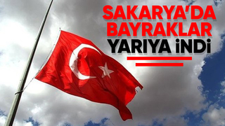 Bayraklar yarıya indirildi