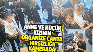 Birbirleri ile işaretleşip çantayı işte böyle çaldılar