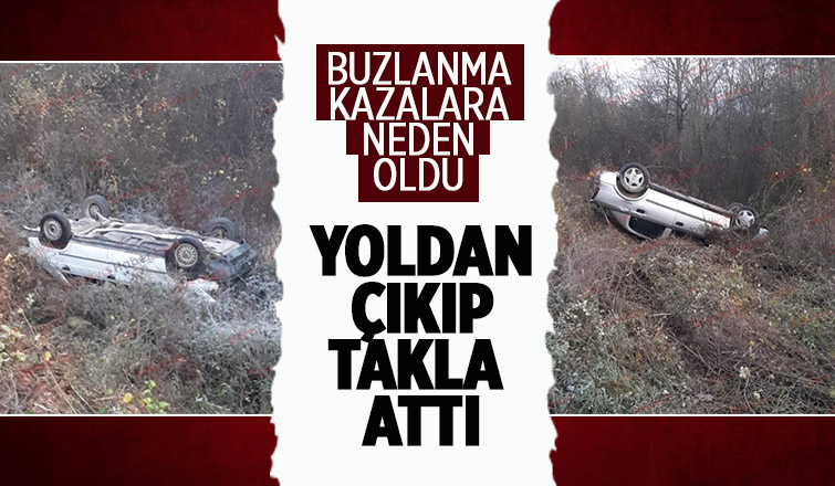 Buzlanan yolda kayıp takla attı