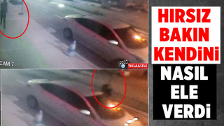 Camı açık otomobilden parayı çaldı