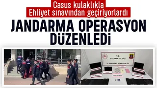 Casus kulaklıkla ehliyet sınavına sokuyorlardı; O çete çökertildi