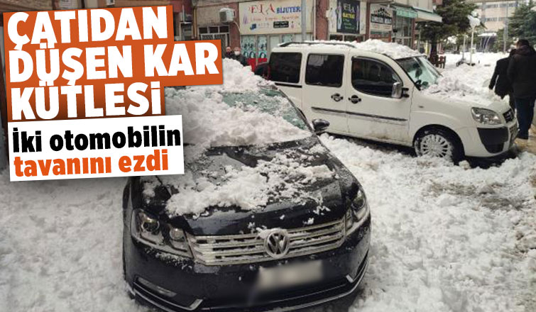 Çatıdan düşen kar kütlesi iki otomobile hasar verdi