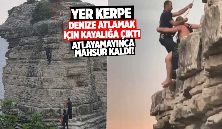 Denize atlamak için çıktığı kayadan mahsur kaldı!