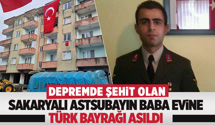 Depremde şehit olan astsubayın evine Türk bayrağı asıldı