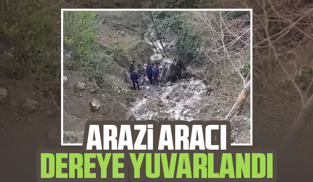 Dereye yuvarlanan araçtan yaralı çıktılar