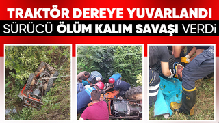 Dereye yuvarlanan traktörün altında kaldı