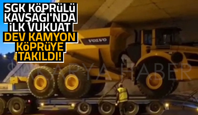 Dev kamyon SGK Kavşağında köprüye takıldı