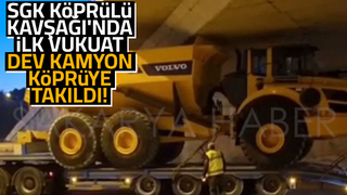 Dev kamyon SGK Kavşağında köprüye takıldı