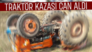 Devrilen traktörün altına kalıp öldü