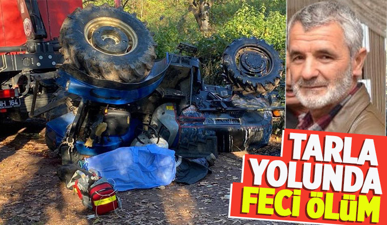 Devrilen traktörün altında can verdi