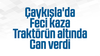 Devrilen traktörün altında can verdi