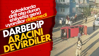 Drift yapan sürücüye kızan mahalleli, aracını devirdi