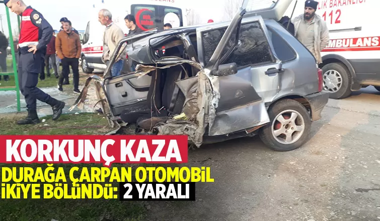 Durağa çarpan otomobil ikiye bölündü