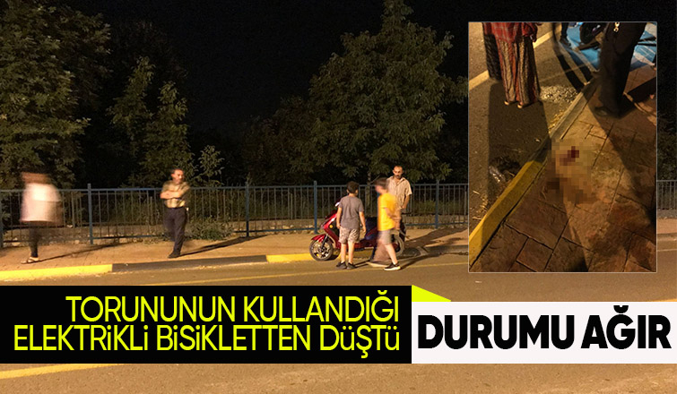 Elektrikli bisikletten düşüp başına kaldırıma çarptı