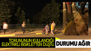 Elektrikli bisikletten düşüp başına kaldırıma çarptı
