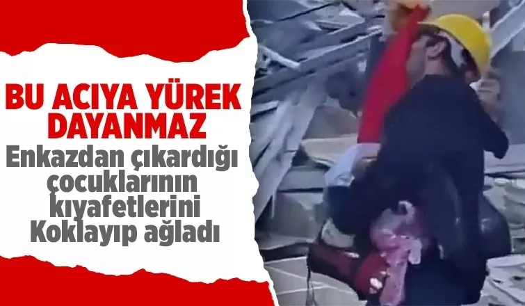 Enkazdan çıkardığı çocuklarının kıyafetlerini koklayıp sarıldı
