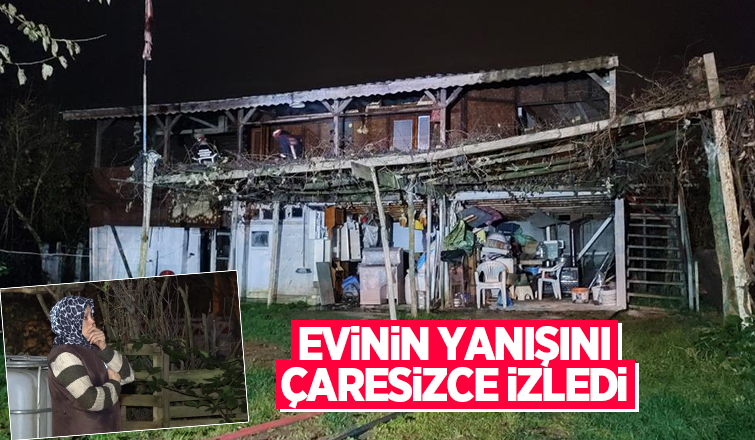 Evinin yanışını çaresizce izledi