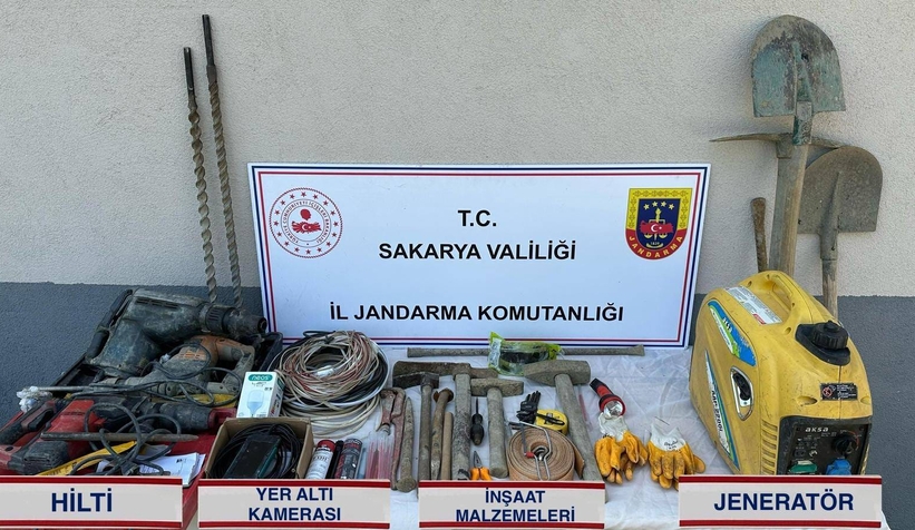 is-makinesi-ile-define-ararken-sucustu-yakalandilarqmq0dllzm2