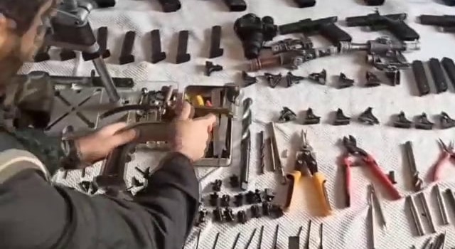 onlarca-silah-ve-balistik-yelek-ele-gecirildid2xhbevgav