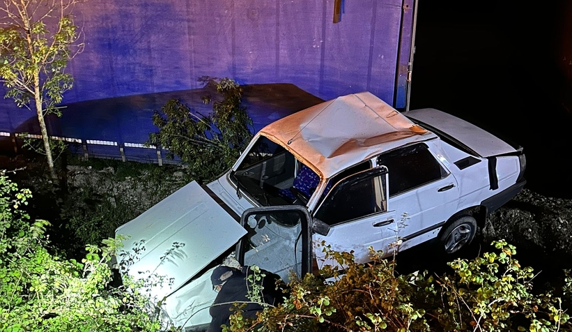 Şarampole uçan araçtan yaralı kurtuldu