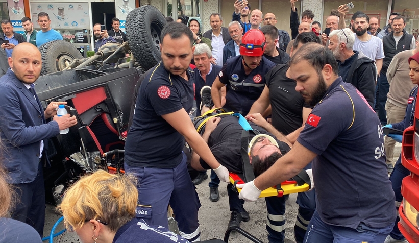 Ters dönen arazi aracında sıkıştı