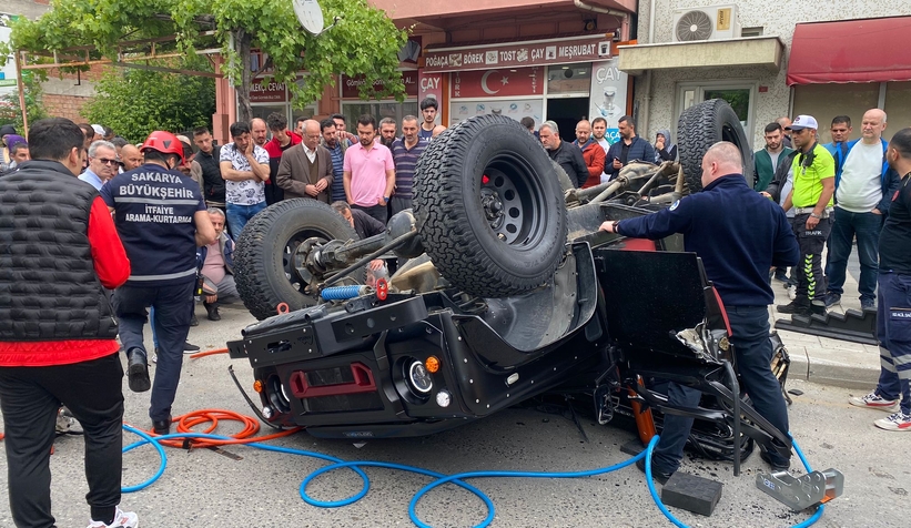 Ters dönen arazi aracında sıkıştı
