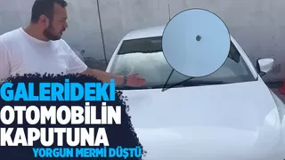 Galerideki otomobilin kaputuna mermi isabet etti