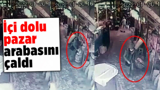 İçi dolu pazar arabasını çaldı