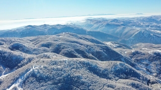  İki kayak merkezinin zirvesi tek karede buluştu
