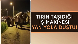 İş makinesi dorseden düştü