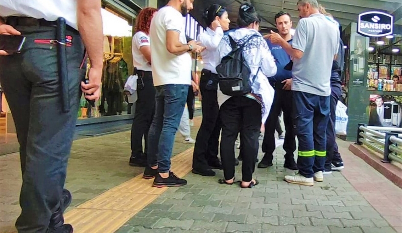 Kadın giyim mağazasında içeriyi mi gözetliyorsun kavgası