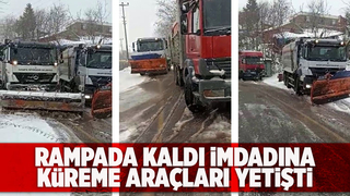 Kamyonun yardımına kar küreme araçları yetişti