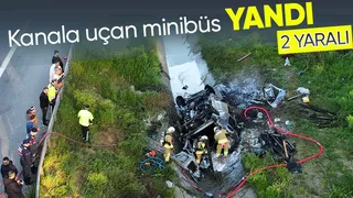 Kanala yuvarlanan minibüs yandı