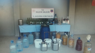 Komşuda  kaçak içki operasyonu