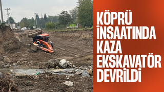 Köprü inşaatında iş makinesi devrildi