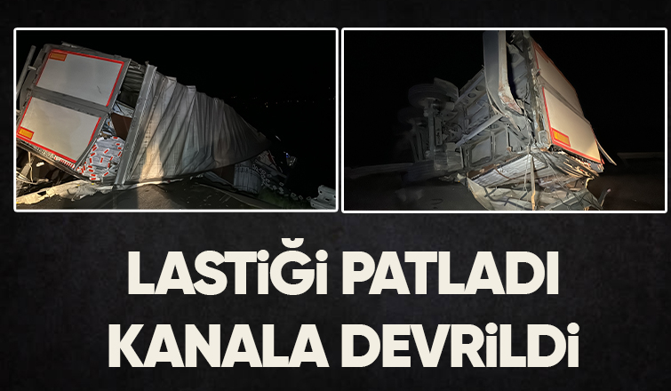 Lastiği patlayan tır kanala uçtu