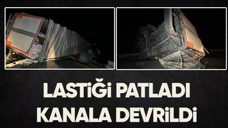 Lastiği patlayan tır kanala uçtu