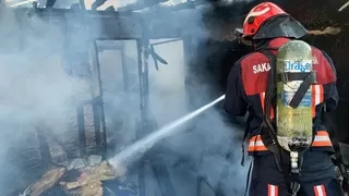 Metruk binada yangın