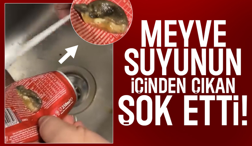 Meyve suyundan çıkan cisimle şok oldu